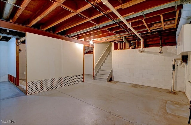 29590 Broxbourne Rd, North Olmsted, OH 44070 - unfinished basement with stairs and concrete block wall