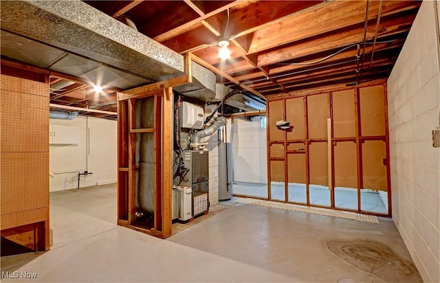 29590 Broxbourne Rd, North Olmsted, OH 44070 - unfinished basement featuring water heater and concrete block wall