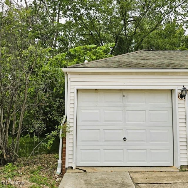 23002 Chandlers Ln Unit 101, Olmsted Falls, OH 44138 - garage with concrete driveway