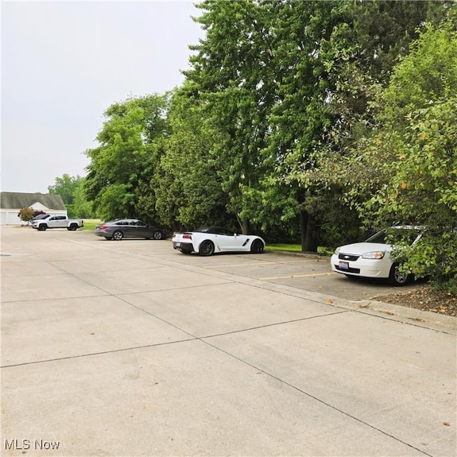 23002 Chandlers Ln Unit 101, Olmsted Falls, OH 44138 - view of uncovered parking lot