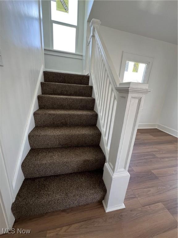 764 Jones St, Hubbard, OH 44425 - stairway featuring wood finished floors, plenty of natural light, and baseboards