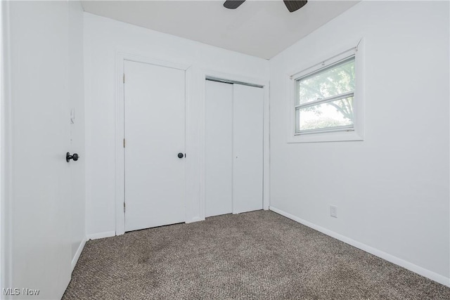 2226 Martha Ave NE, Canton, OH 44705 - unfurnished bedroom with carpet flooring, a closet, and baseboards