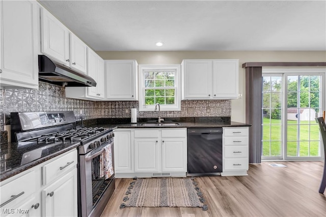 25861 Kennedy Ridge Rd, North Olmsted, OH 44070 - kitchen with dishwasher, stainless steel range with gas cooktop, under cabinet range hood, a sink, and white cabinetry