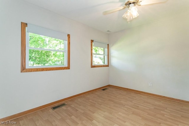 26 Middleton Dr, Painesville Township, OH 44077 - unfurnished room featuring light wood-style flooring, baseboards, and ceiling fan