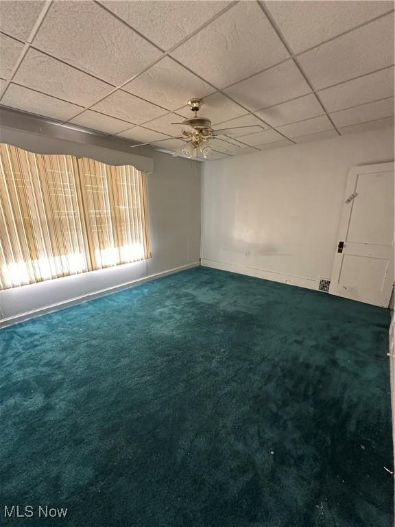1097 Jefferson St, Follansbee, WV 26037 - carpeted spare room featuring a paneled ceiling and baseboards