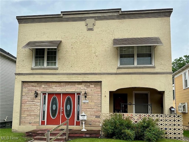 1097 Jefferson St, Follansbee, WV 26037 - view of front of property featuring stucco siding and stone siding