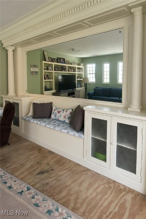 1097 Jefferson St, Follansbee, WV 26037 - living room featuring decorative columns and wood finished floors