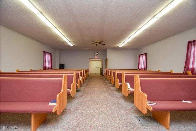 1187 Deforest Rd SE, Warren, OH 44484 - playroom with carpet, a ceiling fan, and a textured ceiling