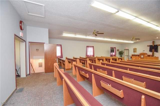 1187 Deforest Rd SE, Warren, OH 44484 - miscellaneous room with carpet flooring, a ceiling fan, a textured ceiling, and an upstairs landing