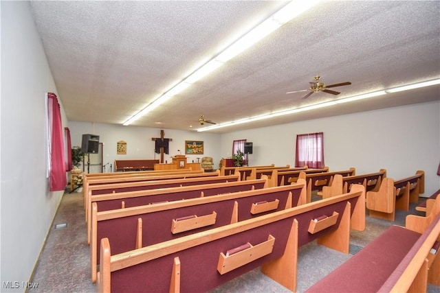 1187 Deforest Rd SE, Warren, OH 44484 - miscellaneous room with a textured ceiling and a ceiling fan