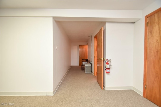 1187 Deforest Rd SE, Warren, OH 44484 - hallway featuring light colored carpet and baseboards