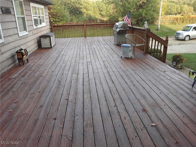 988 E Turkeyfoot Lake Rd, Green, OH 44312 - wooden terrace featuring a grill and cooling unit