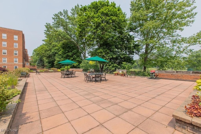 19101 Van Aken Blvd Unit 218, Shaker Heights, OH 44122 - view of patio / terrace featuring outdoor dining space