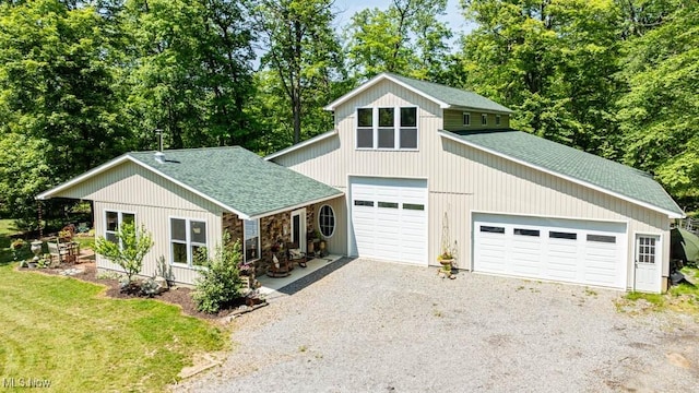 24416 Mountz Rd, Homeworth, OH 44634 - view of front facade with roof with shingles and driveway