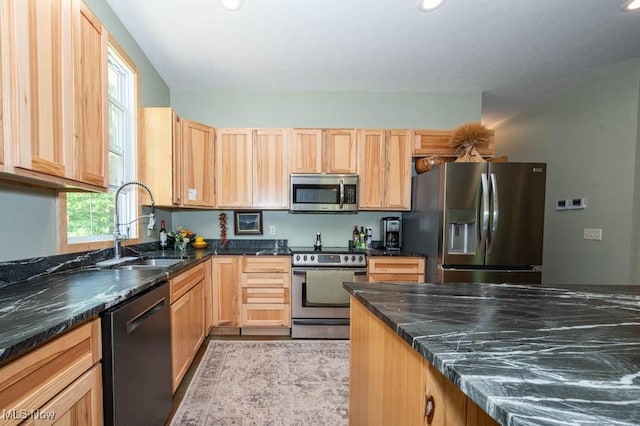 24416 Mountz Rd, Homeworth, OH 44634 - kitchen with appliances with stainless steel finishes, a sink, light brown cabinets, recessed lighting, and dark stone countertops