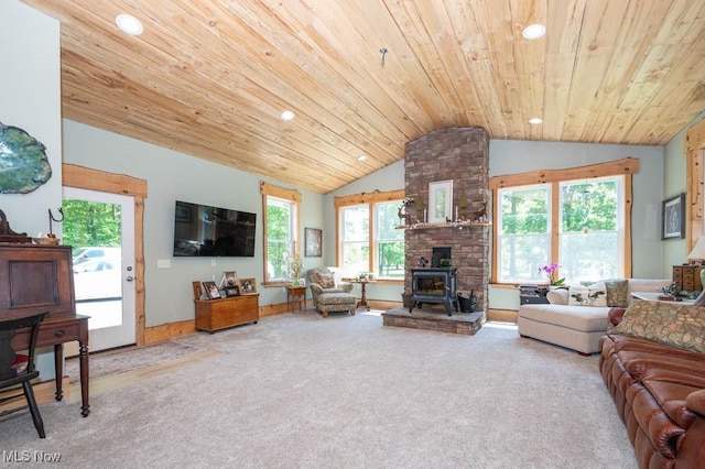 24416 Mountz Rd, Homeworth, OH 44634 - living area with vaulted ceiling, wooden ceiling, carpet flooring, recessed lighting, and a wood stove