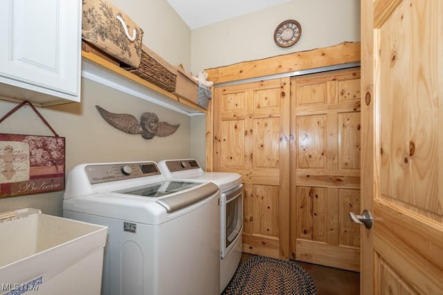 24416 Mountz Rd, Homeworth, OH 44634 - laundry area featuring cabinet space and washer and dryer