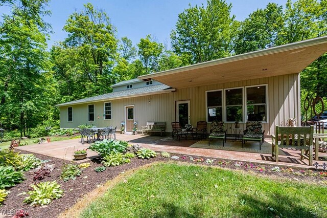 24416 Mountz Rd, Homeworth, OH 44634 - back of house with a patio area
