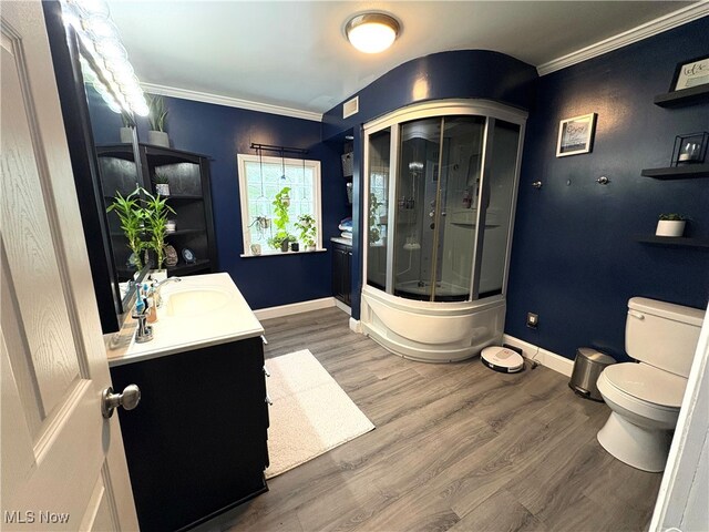 1720 Blosser Ln, Follansbee, WV 26037 - full bathroom with vanity, a shower with shower door, crown molding, toilet, and wood finished floors