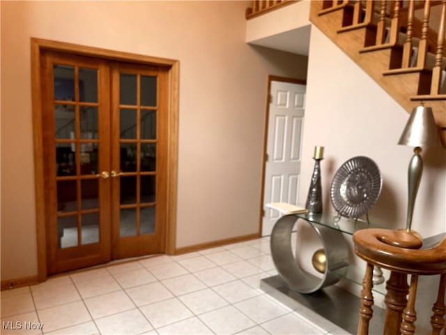 12701 Gordon St, North Royalton, OH 44133 - workout room featuring french doors and light tile patterned floors