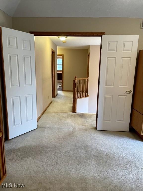 12701 Gordon St, North Royalton, OH 44133 - corridor with an upstairs landing and light colored carpet
