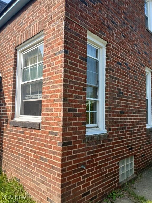 230 E 211th St, Euclid, OH 44123 - view of home's exterior with brick siding