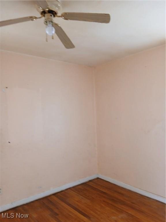 230 E 211th St, Euclid, OH 44123 - empty room with a ceiling fan, wood finished floors, and baseboards