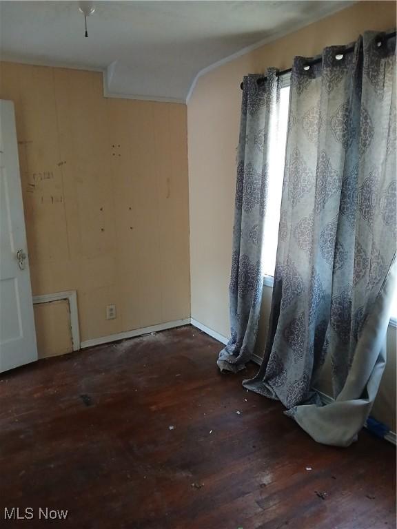230 E 211th St, Euclid, OH 44123 - unfurnished room featuring ornamental molding and wood-type flooring