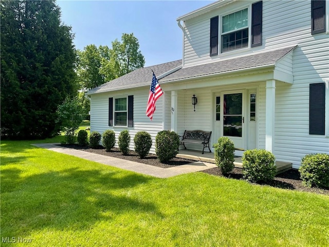 180 Atterbury Blvd, Hudson, OH 44236 - view of front facade featuring covered porch, a front lawn, and a shingled roof