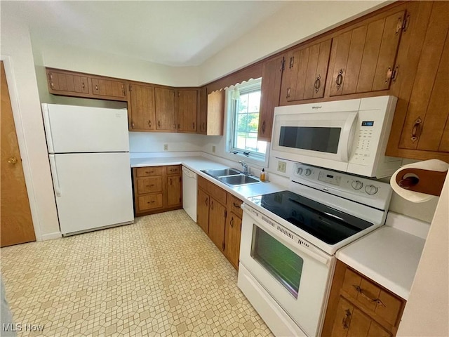 180 Atterbury Blvd, Hudson, OH 44236 - kitchen featuring white appliances, a sink, brown cabinets, and light countertops