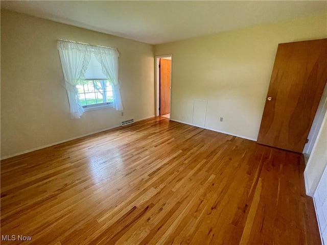 180 Atterbury Blvd, Hudson, OH 44236 - empty room with wood finished floors and baseboards
