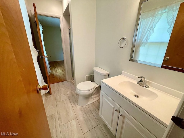 180 Atterbury Blvd, Hudson, OH 44236 - bathroom featuring vanity, toilet, and a shower stall
