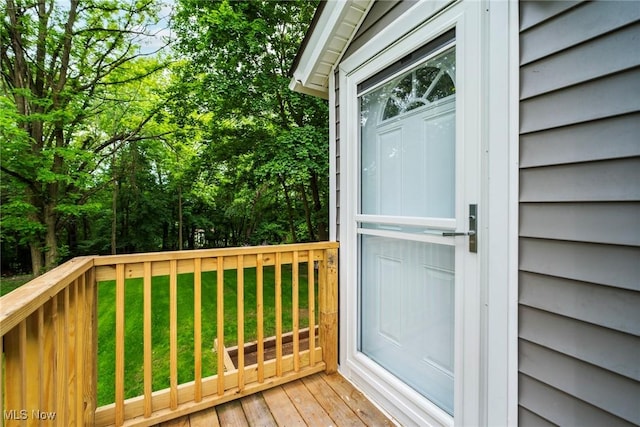 90 Frank St, Struthers, OH 44471 - doorway to property featuring a yard and a deck