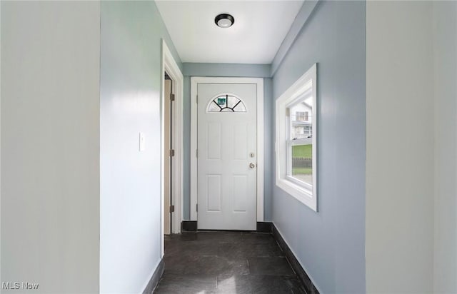 90 Frank St, Struthers, OH 44471 - doorway to outside featuring baseboards