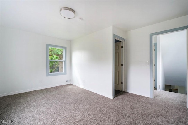 90 Frank St, Struthers, OH 44471 - spare room featuring carpet flooring and baseboards