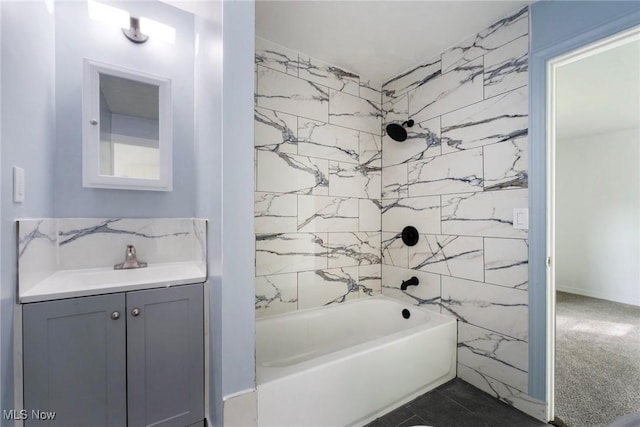 90 Frank St, Struthers, OH 44471 - bathroom featuring washtub / shower combination, vanity, and tile walls