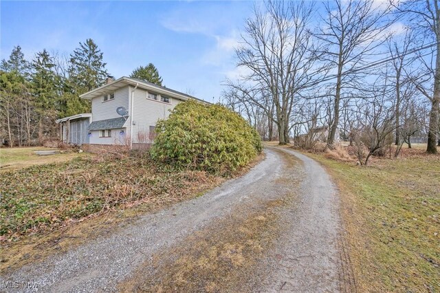 12873 Unity Rd, New Springfield, OH 44443 - view of side of home with driveway