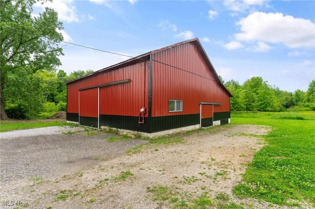 3371 Padanarum Rd, Geneva, OH 44041 - view of side of property featuring a pole building, an outbuilding, and a garage
