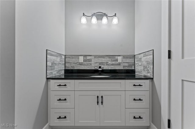 3371 Padanarum Rd, Geneva, OH 44041 - bathroom featuring tasteful backsplash, vanity, and baseboards