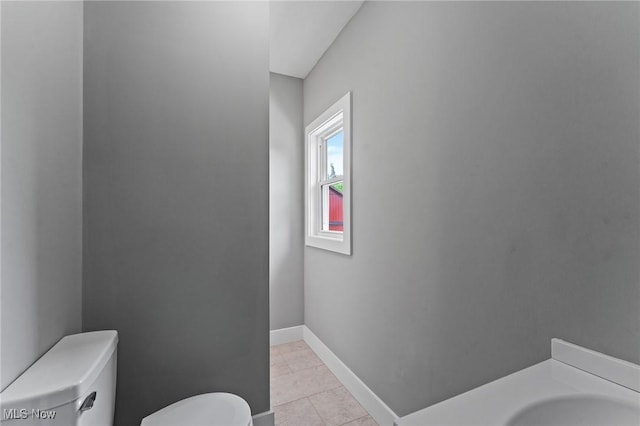 3371 Padanarum Rd, Geneva, OH 44041 - bathroom featuring toilet, tile patterned floors, and baseboards