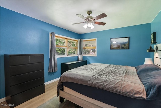 525 Hill Blvd, East Liverpool, OH 43920 - bedroom with wood finished floors, baseboards, and a ceiling fan