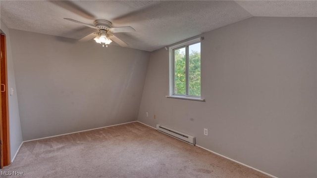 62253 Forestview Dr, Cambridge, OH 43725 - spare room with baseboard heating, carpet floors, a textured ceiling, ceiling fan, and lofted ceiling