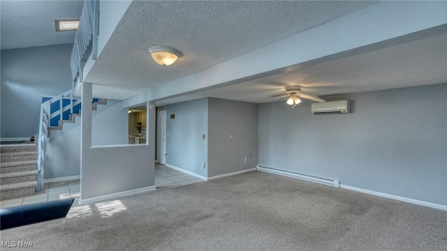 62253 Forestview Dr, Cambridge, OH 43725 - tiled spare room featuring baseboard heating, a wall mounted air conditioner, carpet, a ceiling fan, and stairway