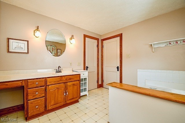837 Lake Ave NE, Massillon, OH 44646 - full bathroom with vanity, tile patterned floors, and a tub