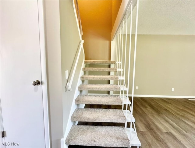 6400 Center St Unit 14, Mentor, OH 44060 - staircase with wood finished floors and baseboards