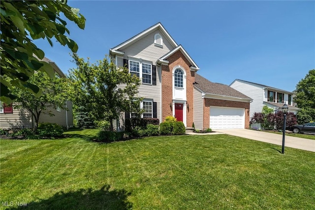3079 Landing Ln, Reminderville, OH 44202 - view of front of property with an attached garage, brick siding, a front lawn, and concrete driveway
