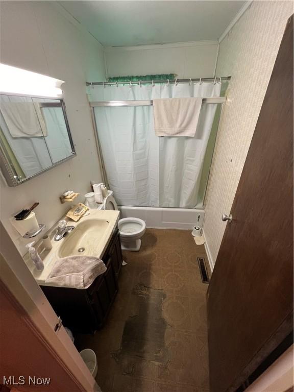 156 Andover Rd, Woodsfield, OH 43793 - full bath with vanity, shower / tub combo with curtain, toilet, crown molding, and tile patterned floors