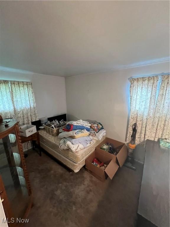 156 Andover Rd, Woodsfield, OH 43793 - carpeted bedroom featuring crown molding