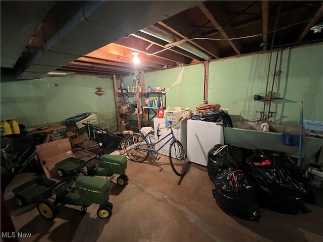 156 Andover Rd, Woodsfield, OH 43793 - unfinished basement with washer and clothes dryer