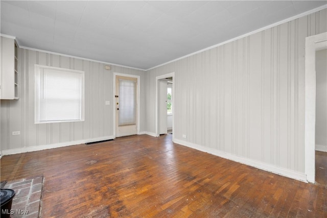 348 Elberta Dr, Vermilion, OH 44089 - unfurnished living room featuring hardwood / wood-style flooring, crown molding, and baseboards